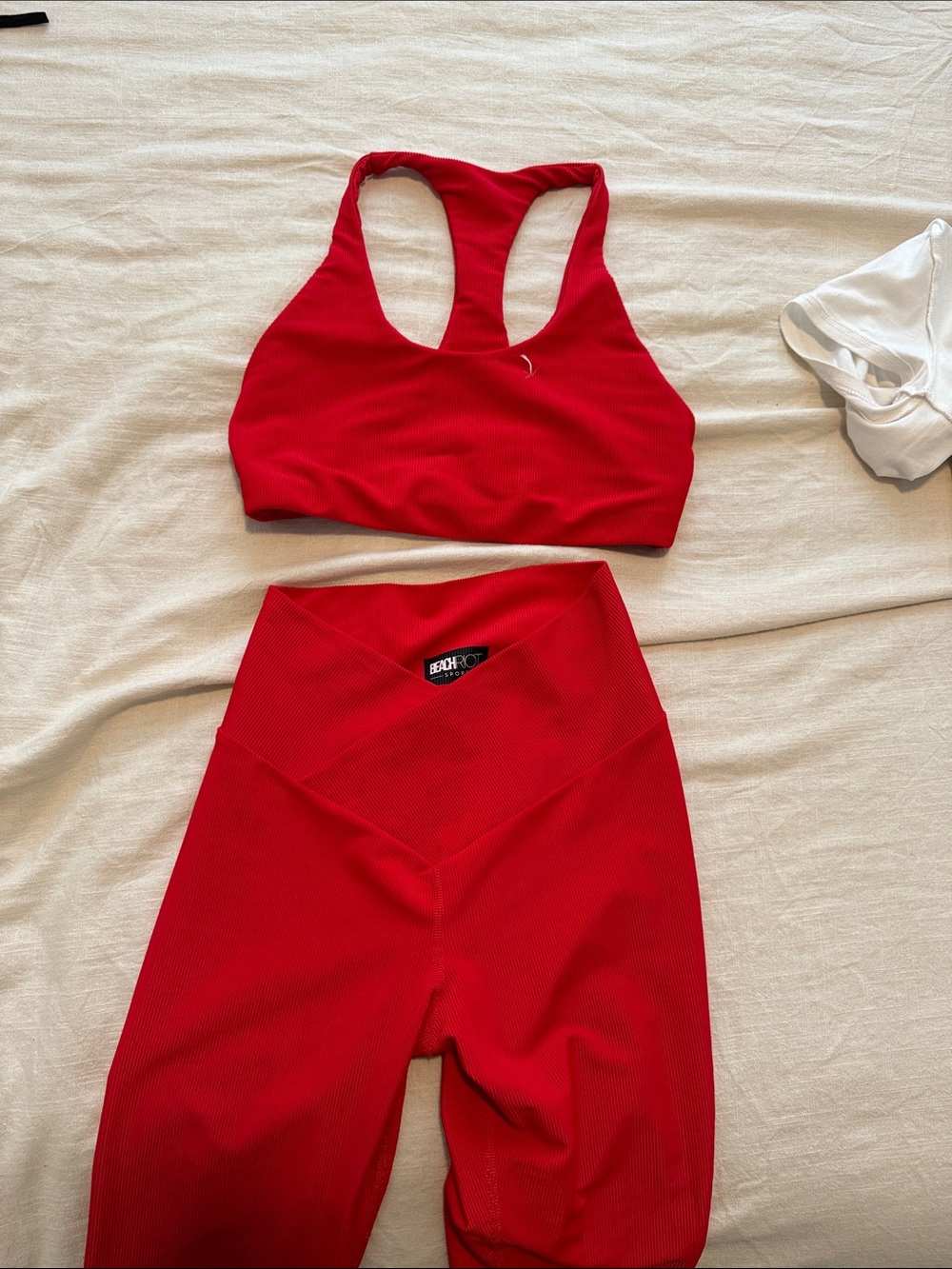 Beach Riot Red Ribbed Racerback Sports Bra and Cross-Waist Leggings